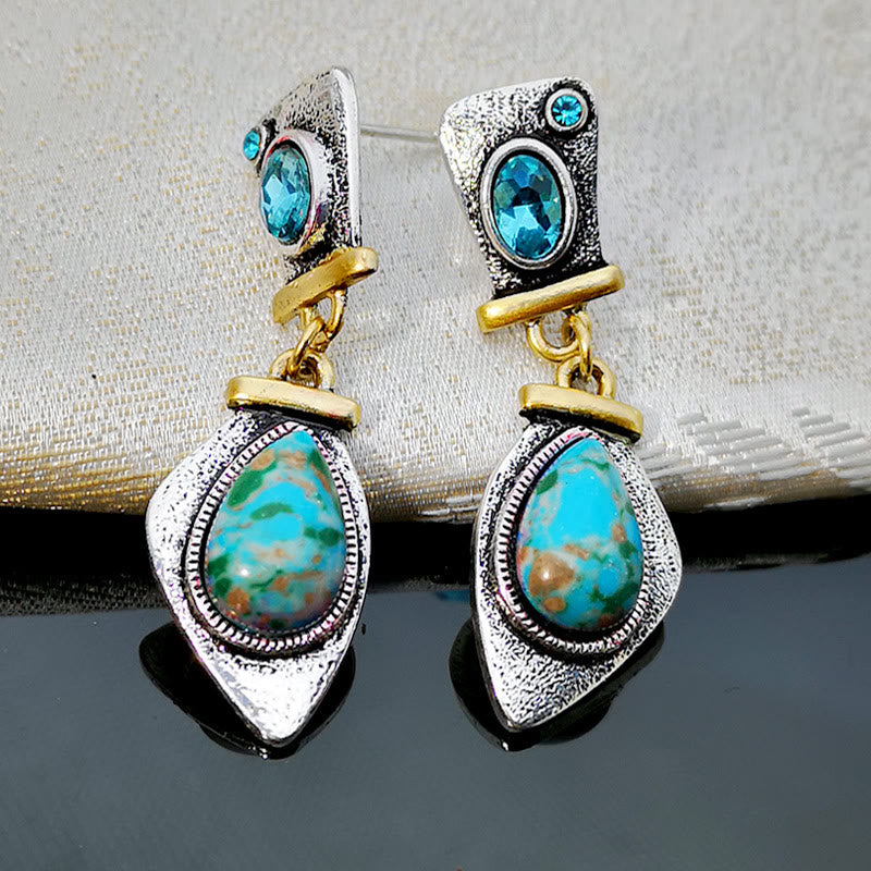 Pendientes de plata con topacio azul y piedra emperadora de Olivenorma
