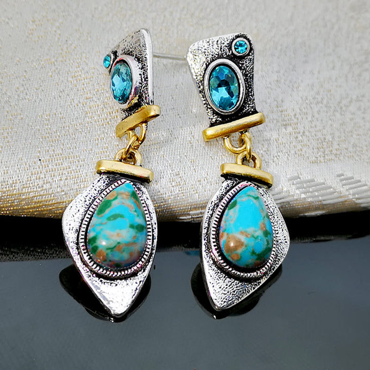 Pendientes de plata con topacio azul y piedra emperadora de Olivenorma