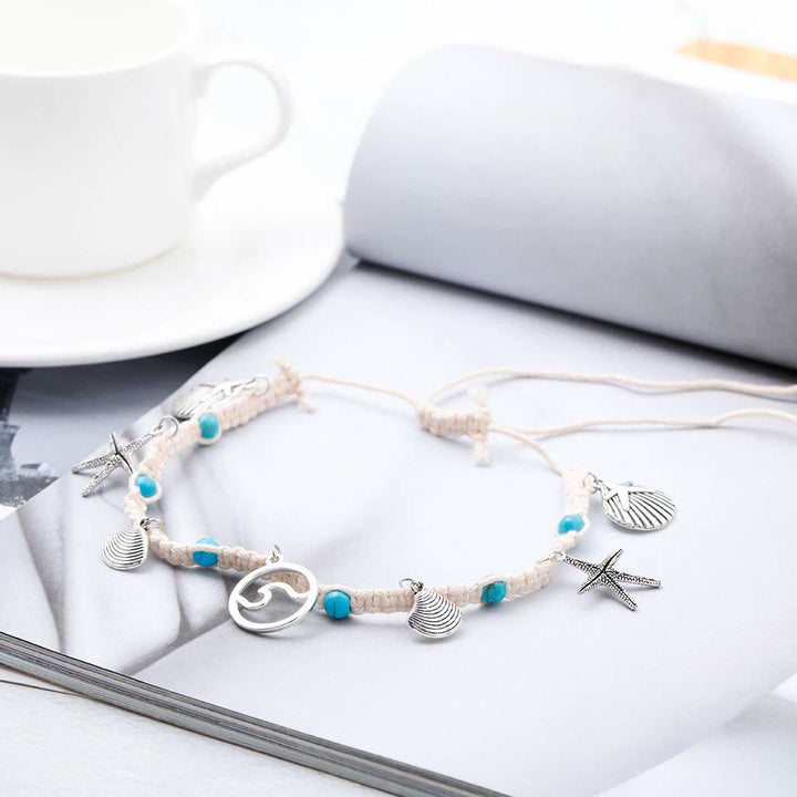 Pulsera tobillera con dije de estrella de mar turquesa y olas de Olivenorma