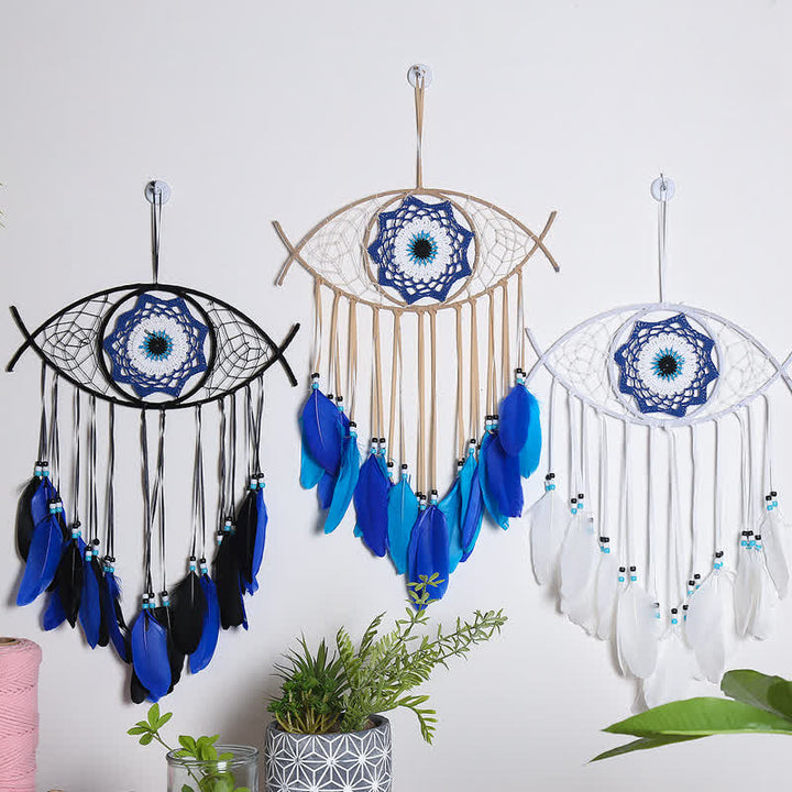 Atrapasueños de plumas de mal de ojo azul 