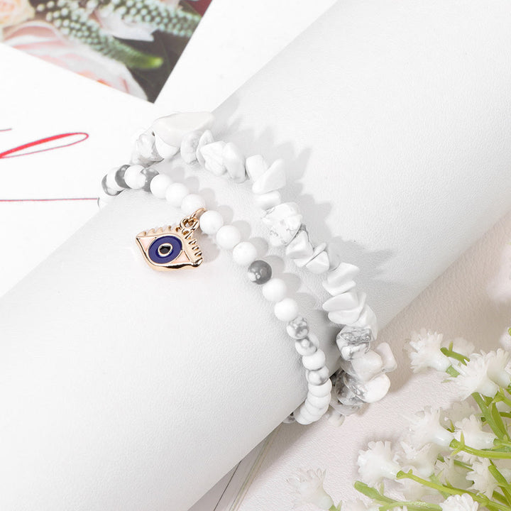 Juego de pulseras de cristal de doble capa con colgante de ojo malvado de Olivenorma