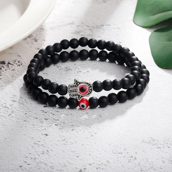 Pulsera de protección con ojo turco y hamsa de Olivenorma 