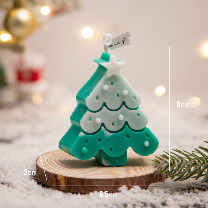 Vela perfumada con forma de hombrecito de jengibre y copos de nieve con atmósfera navideña de Olivenorma 