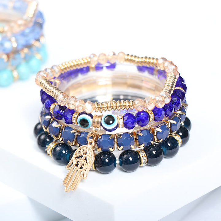 Juego de pulseras de cuentas de cuatro capas con ojo turco y hamsa de Olivenorma 
