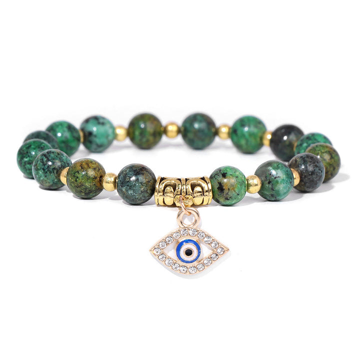 Pulsera con colgante de ojo malvado y cuentas de piedra natural de Olivenorma