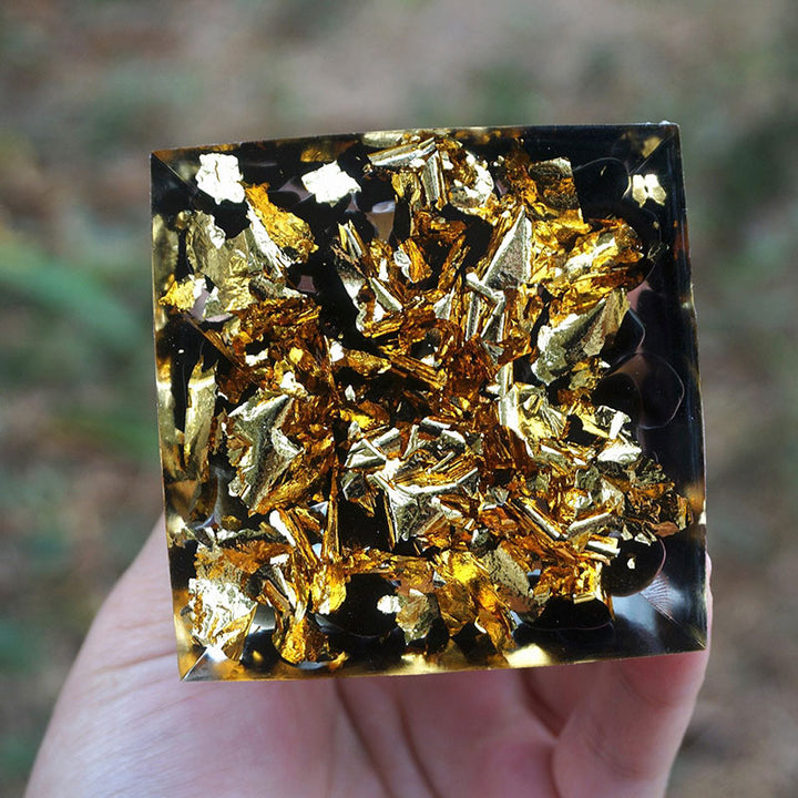 Esfera de ojo de tigre de Olivenorma y pirámide de orgón protectora de obsidiana 