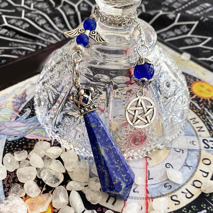 Péndulo con alas de corona de cristal de lapislázuli de Olivenorma