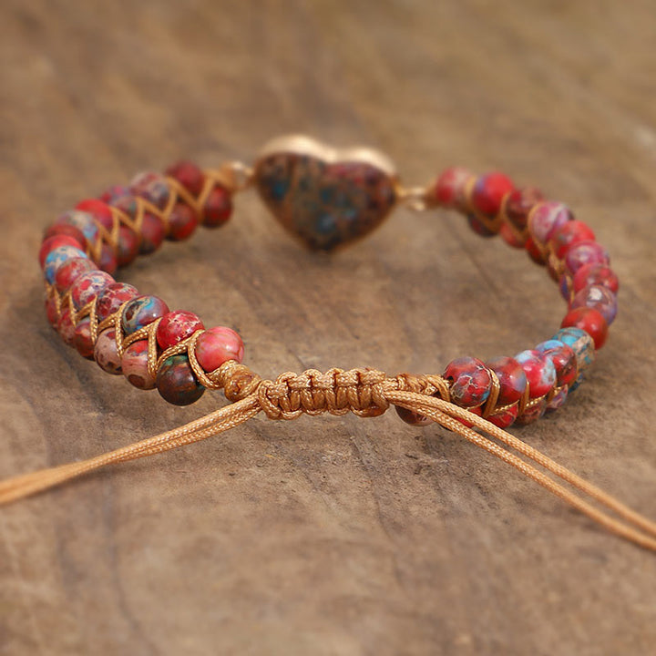 Pulsera de corazón de piedra roja del emperador Olivenorma