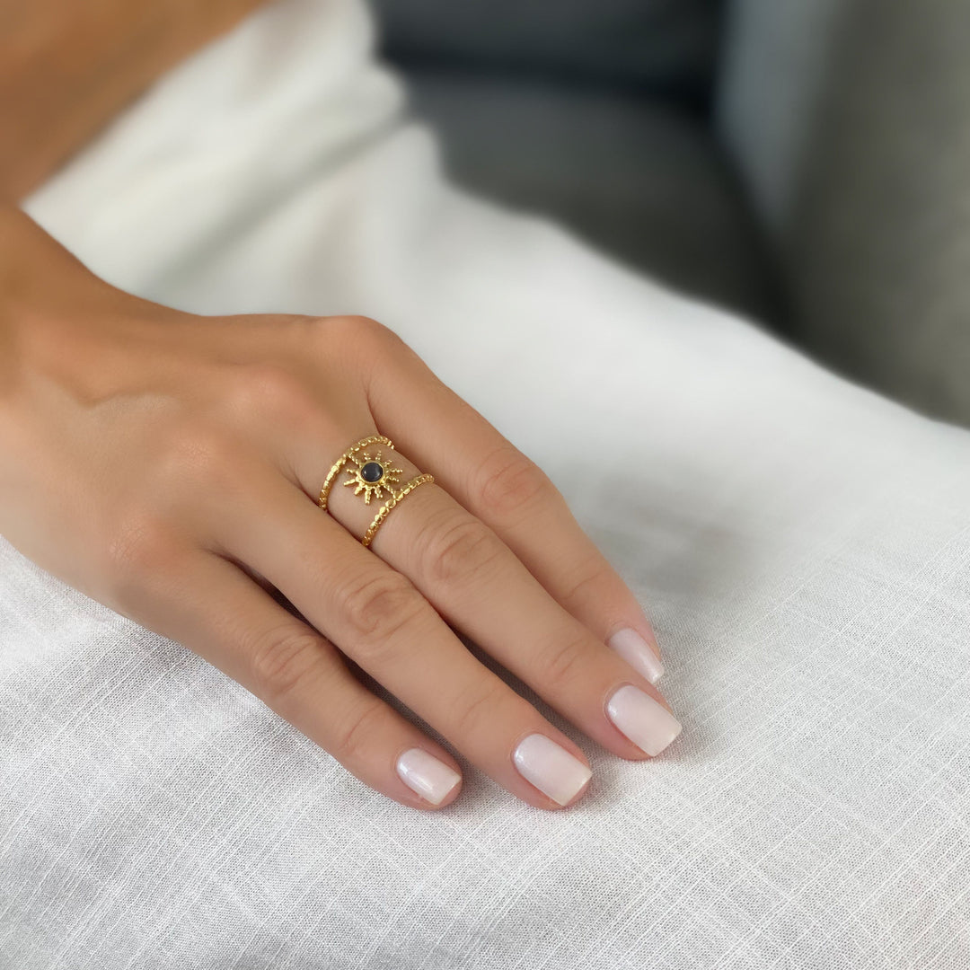 Anillo de gemas con estrella de ocho puntas y doble hilera de girasol de Olivenorma