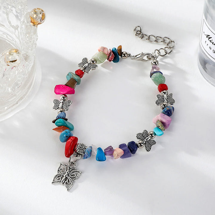 Pulsera con dije de mariposa de escombros de cristal colorido de Olivenorma