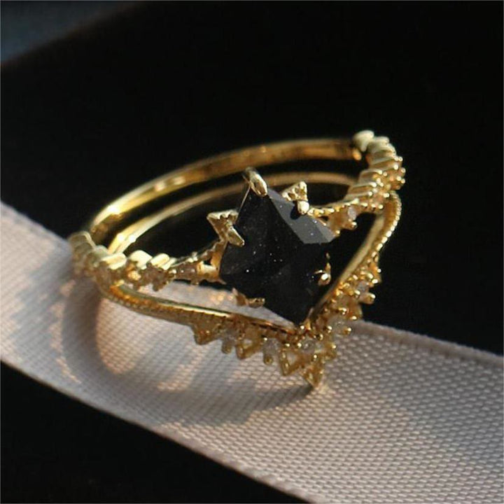 Anillo de corona de doble hilera de circonitas blancas y arenisca azul de Olivenorma
