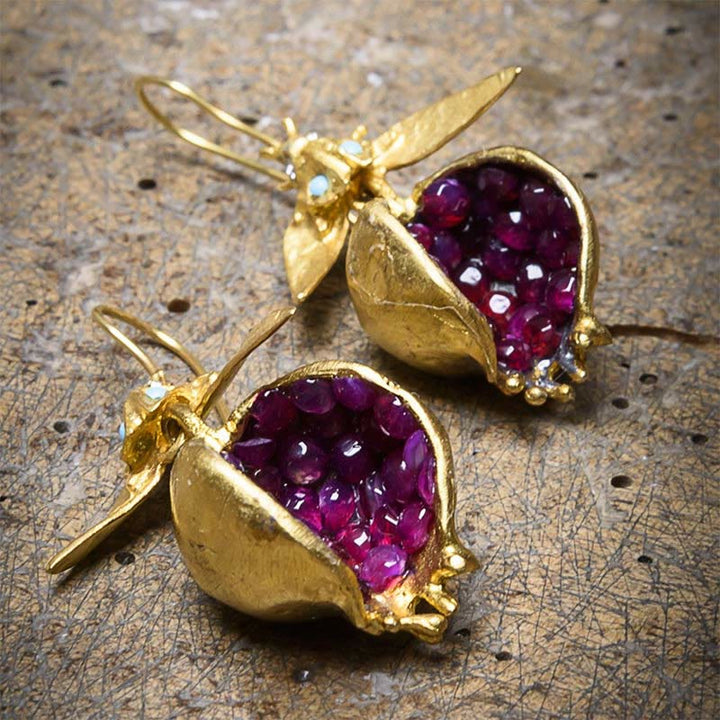 Pendientes de moda con semillas de granada de la suerte de Olivenorma