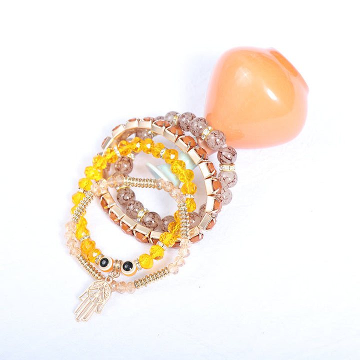 Juego de pulseras de cuentas de cuatro capas con ojo turco y hamsa de Olivenorma 