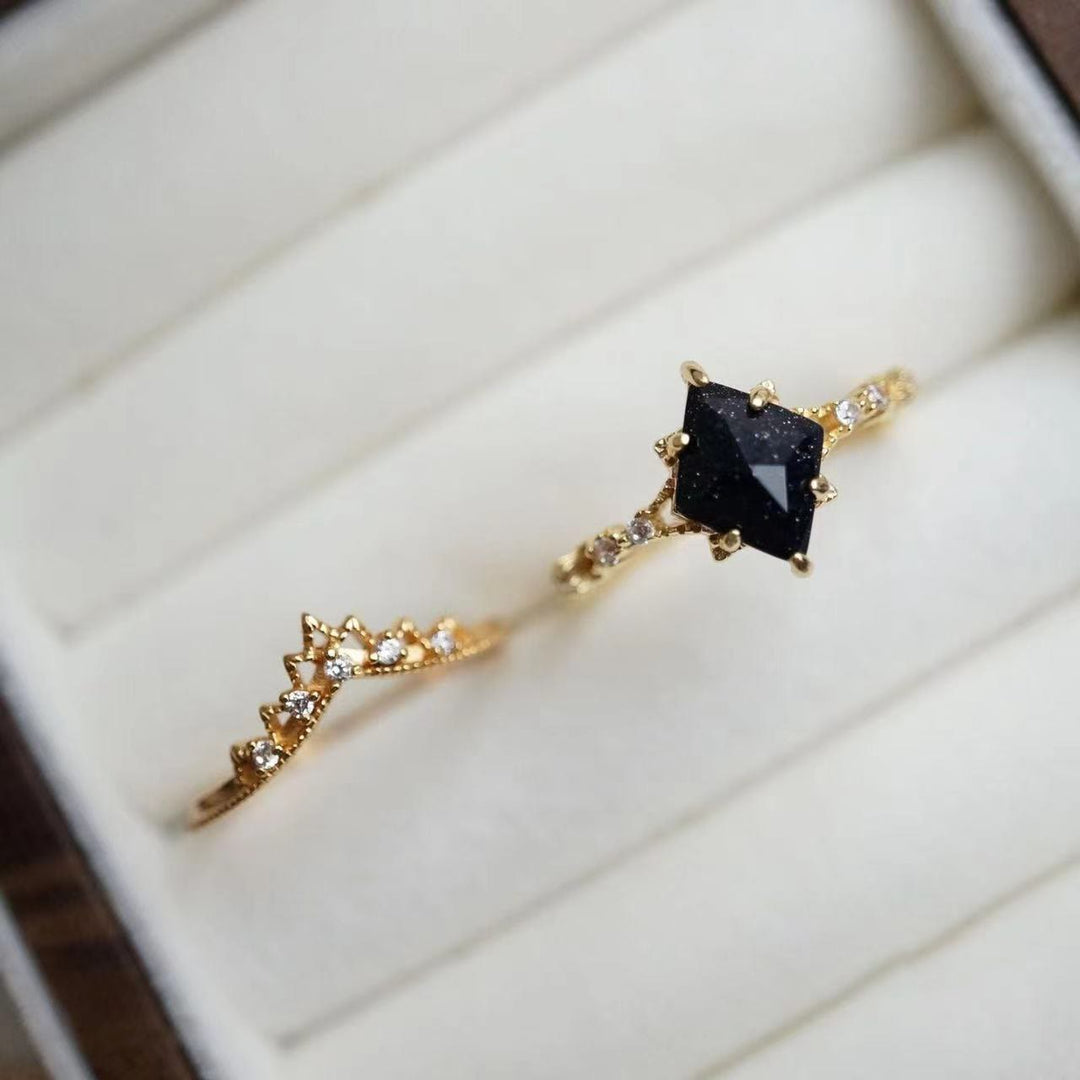 Anillo de corona de doble hilera de circonitas blancas y arenisca azul de Olivenorma
