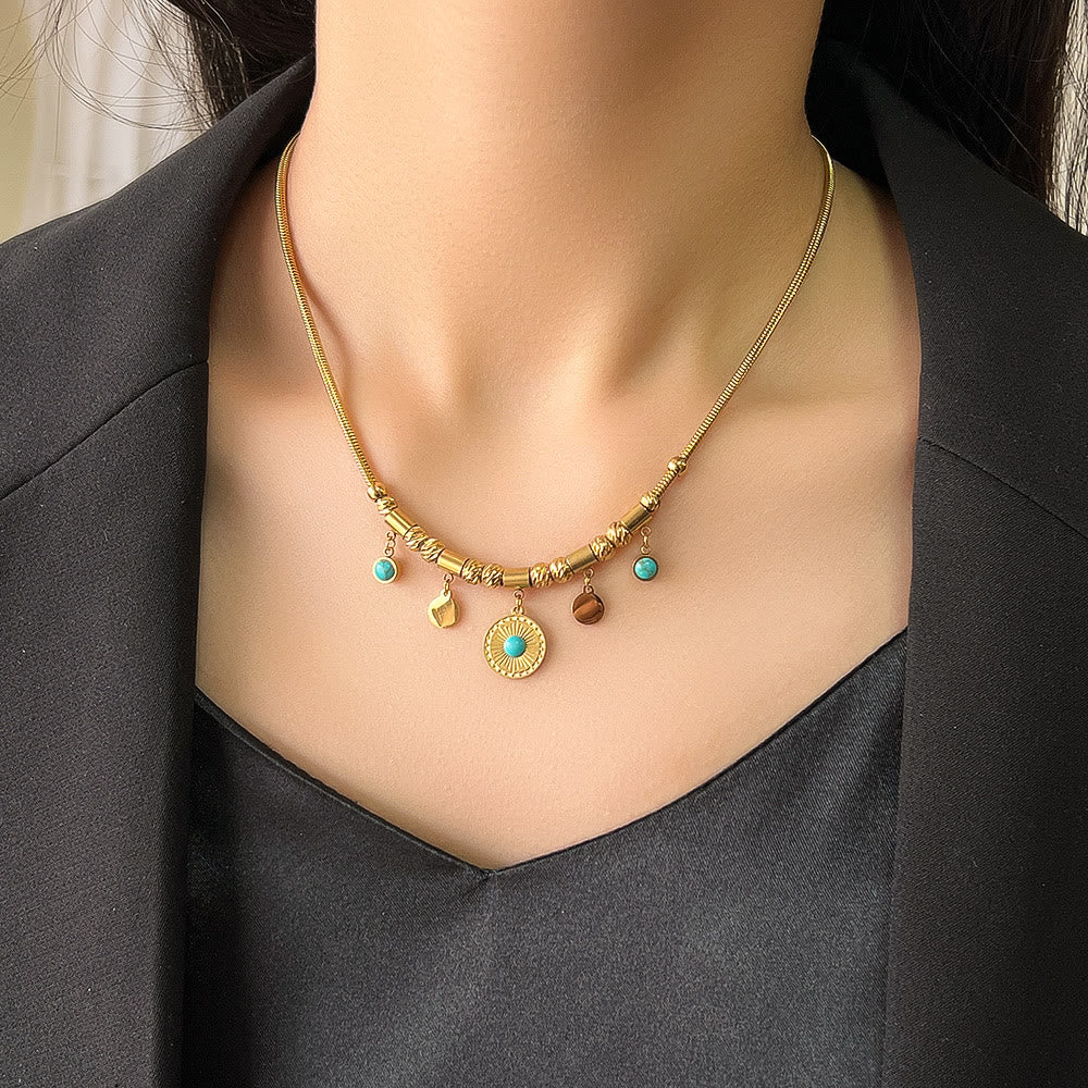 Pulsera envolvente con ojo malvado de turquesa dorada de Olivenorma