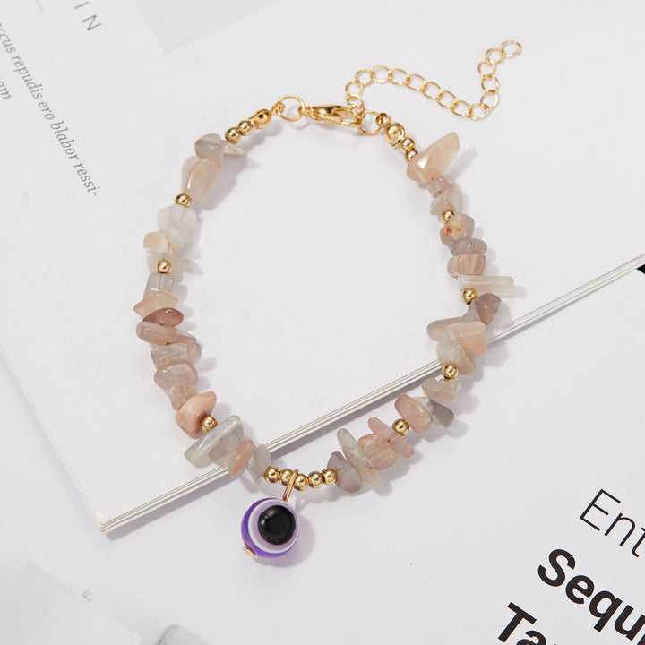 Pulsera con colgante de ojo malvado de grava de cristal natural de Olivenorma