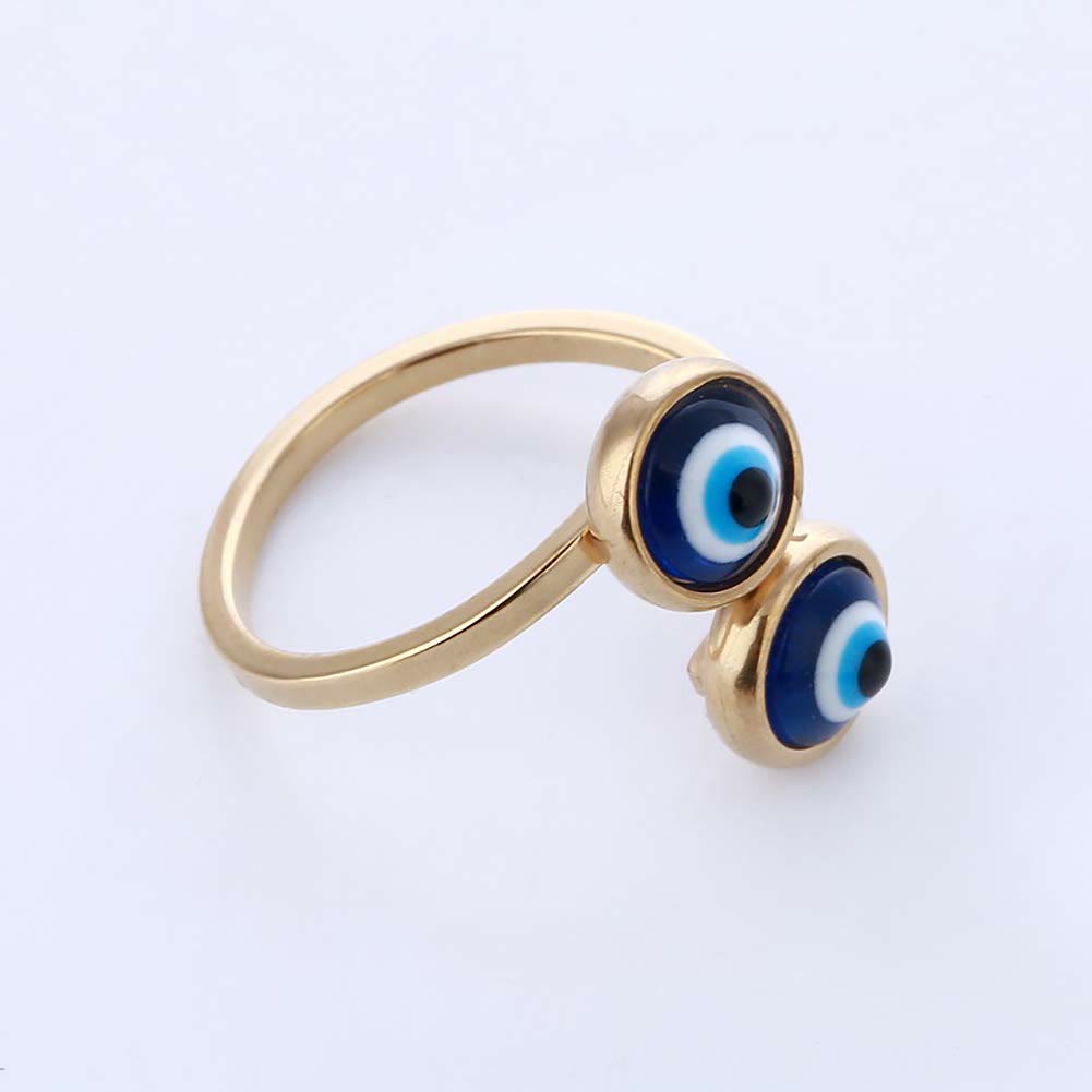 Anillo de mujer con ojo malvado bañado en oro y circonita blanca de Olivenorma 
