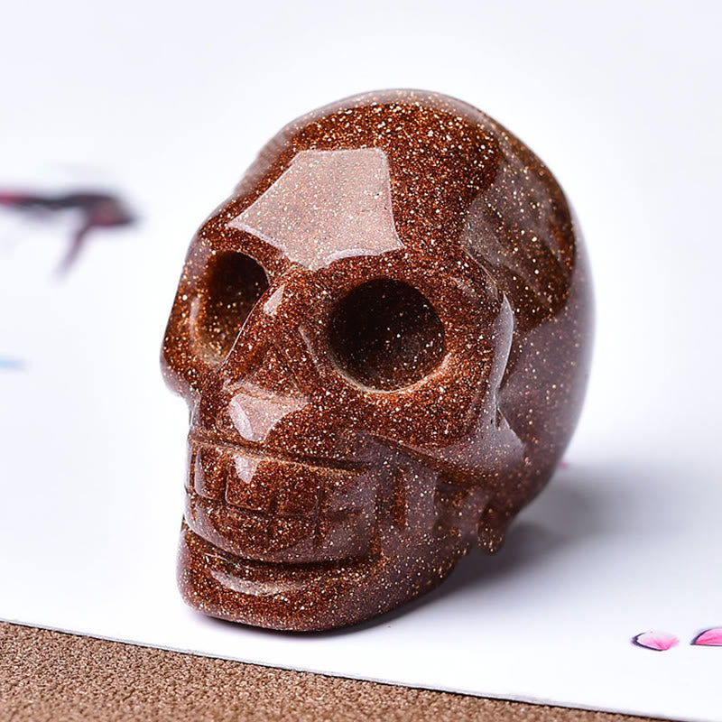 Artesanía con calaveras grabadas en cristal de Olivenorma , decoración con piedras preciosas