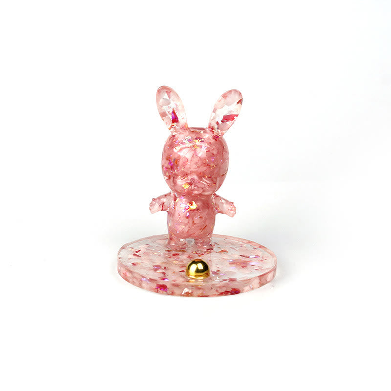 Soporte para teléfono móvil con forma de conejo de epoxi y grava de cristal natural de Olivenorma