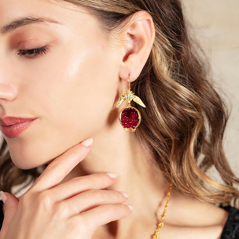 Pendientes de moda con semillas de granada de la suerte de Olivenorma