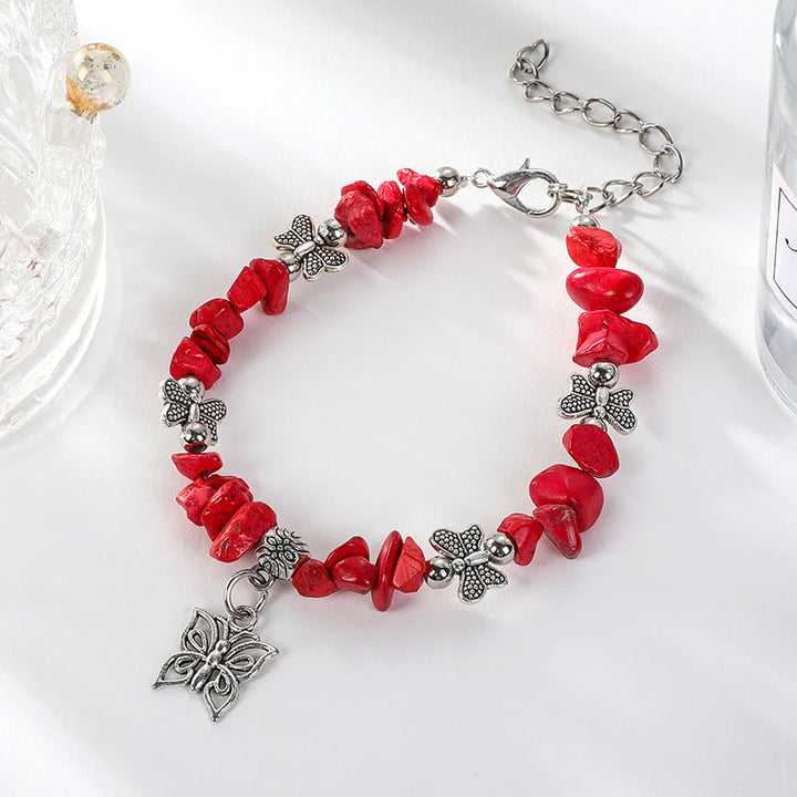 Pulsera con dije de mariposa de escombros de cristal colorido de Olivenorma