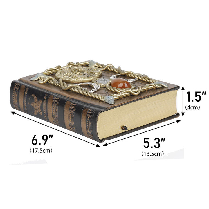 Cuaderno de notas con los signos del zodíaco de la luna, la estrella y el ágata roja de Olivenorma