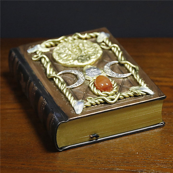 Cuaderno de notas con los signos del zodíaco de la luna, la estrella y el ágata roja de Olivenorma