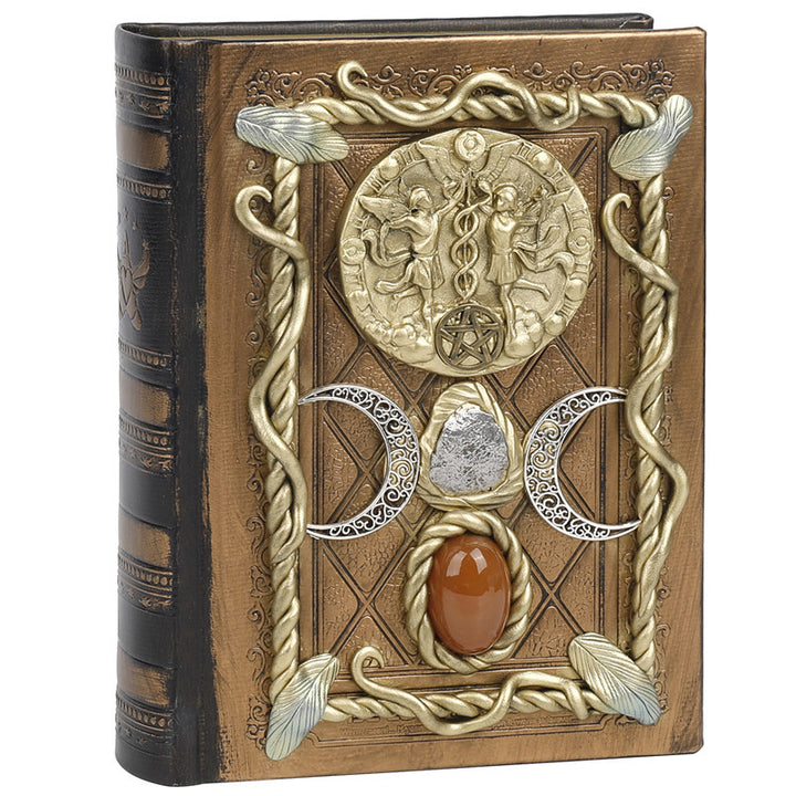 Cuaderno de notas con los signos del zodíaco de la luna, la estrella y el ágata roja de Olivenorma