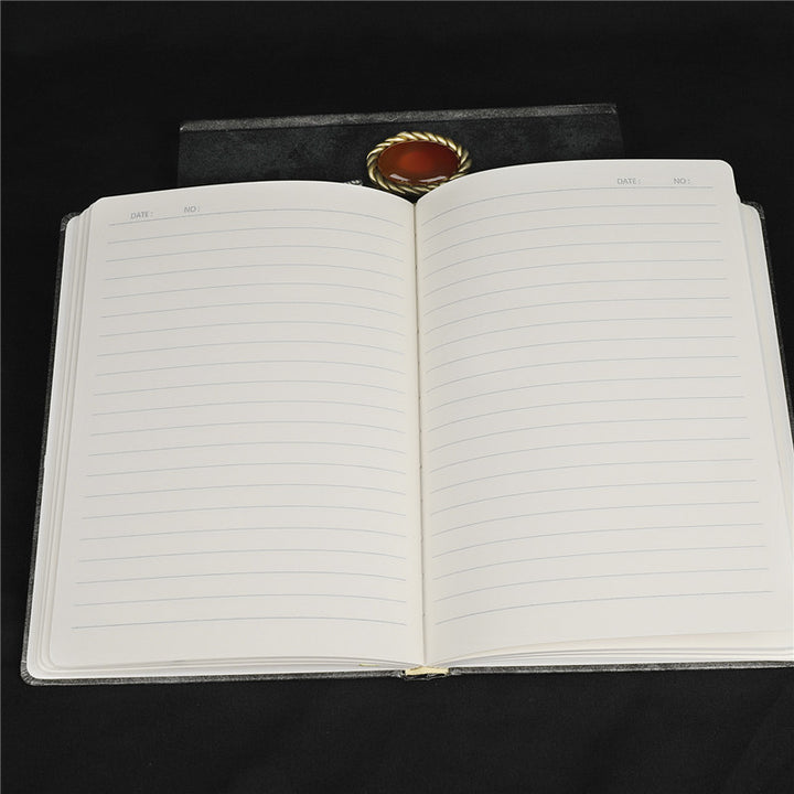 Libreta decorativa con estampado de caballito de mar turquesa y ágata roja de Olivenorma
