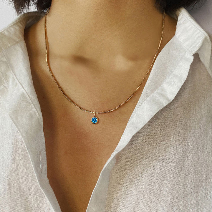 Collar de acero y titanio con circonitas y piedra natal de 8 mm de Olivenorma 