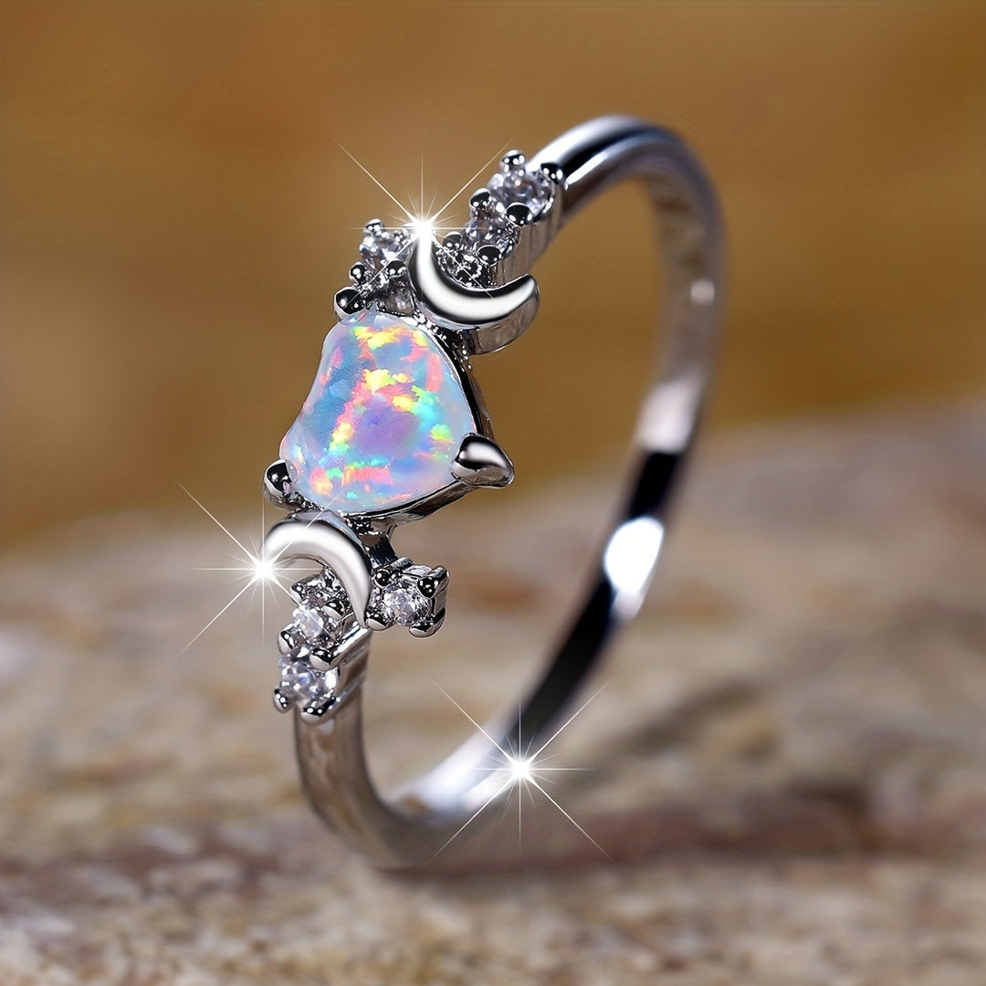 Anillo de fases lunares con corazón de ópalo "Light Of Our Love" de Olivenorma 