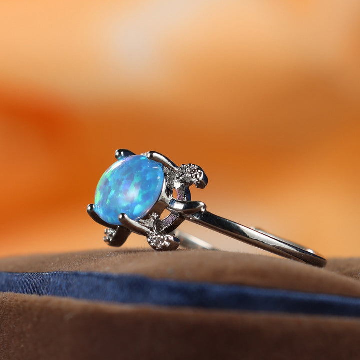 Anillo de ópalo azul con linda tortuga marina de Olivenorma