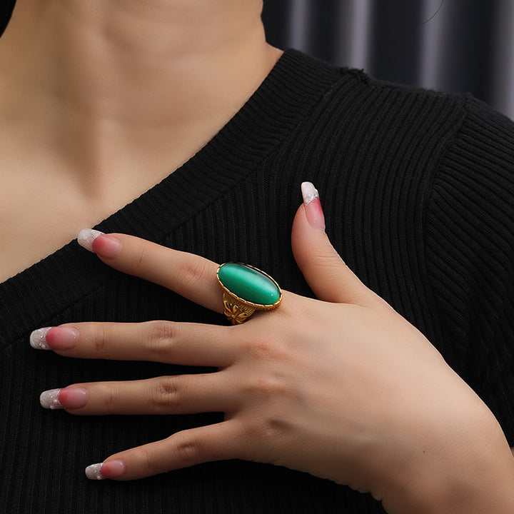 Anillo con piedra de ojo de gato ovalada blanca y verde de Olivenorma