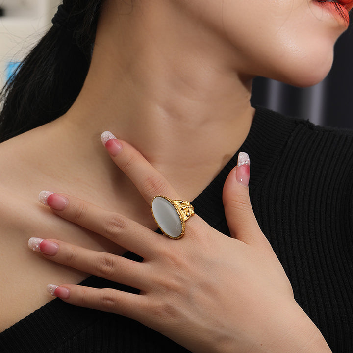 Anillo con piedra de ojo de gato ovalada blanca y verde de Olivenorma