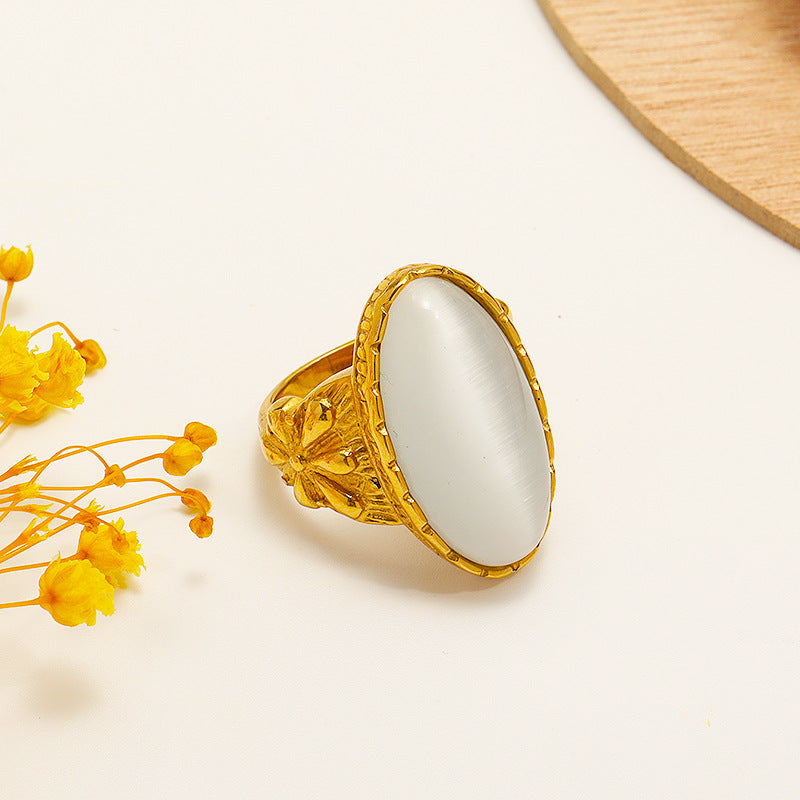 Anillo con piedra de ojo de gato ovalada blanca y verde de Olivenorma
