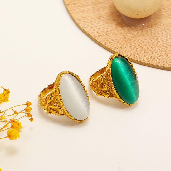 Anillo con piedra de ojo de gato ovalada blanca y verde de Olivenorma