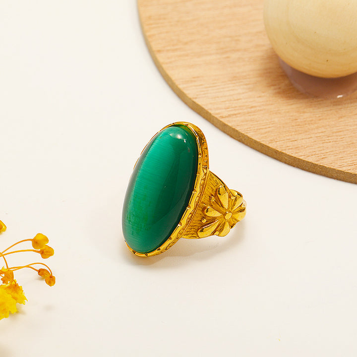 Anillo con piedra de ojo de gato ovalada blanca y verde de Olivenorma