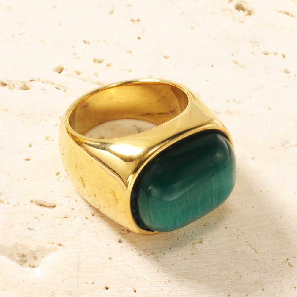 Anillo de acero y titanio con piedra de ojo de gato ovalada y turquesa de Olivenorma