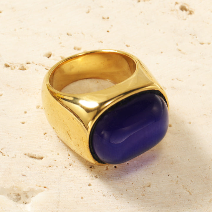 Anillo de acero y titanio con piedra de ojo de gato ovalada y turquesa de Olivenorma