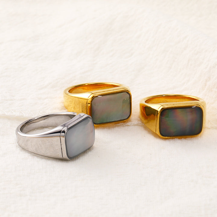 Anillo de acero y titanio con concha de abulón y nácar rectangular de Olivenorma