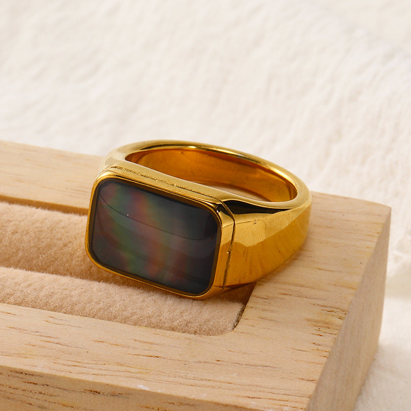 Anillo de acero y titanio con concha de abulón y nácar rectangular de Olivenorma