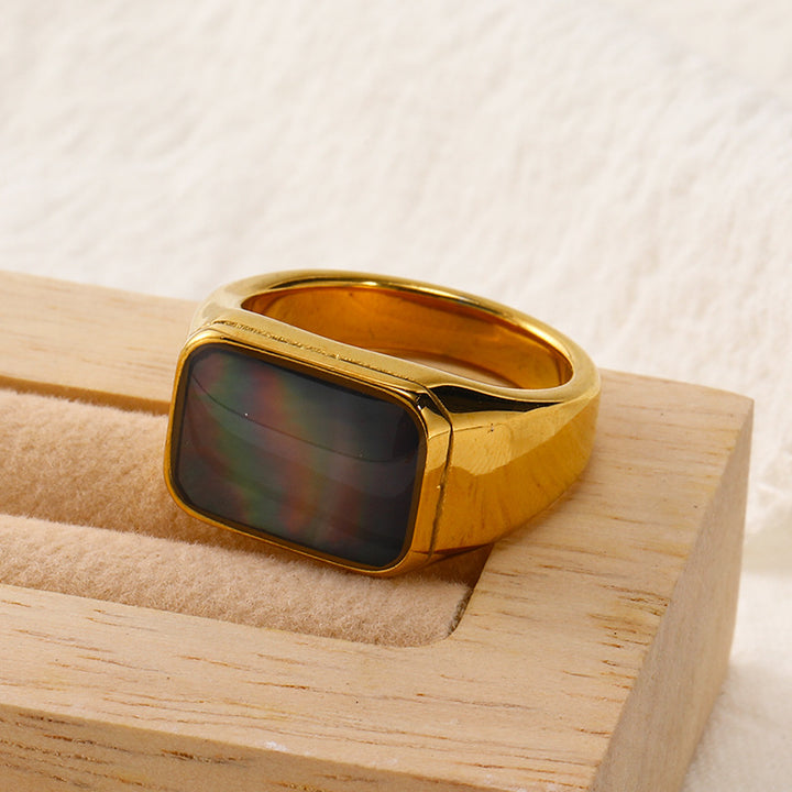 Anillo de acero y titanio con concha de abulón y nácar rectangular de Olivenorma