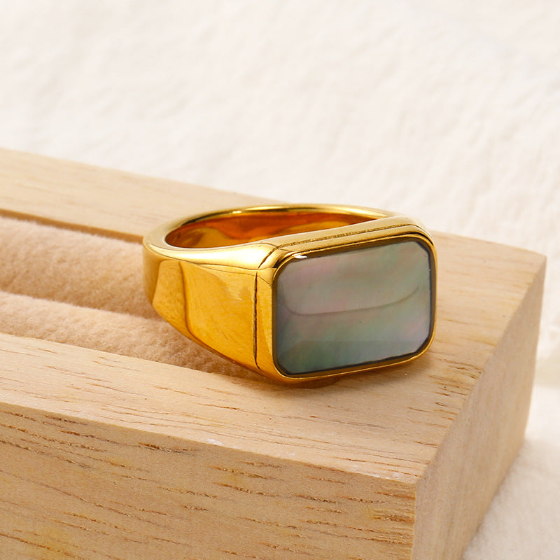 Anillo de acero y titanio con concha de abulón y nácar rectangular de Olivenorma