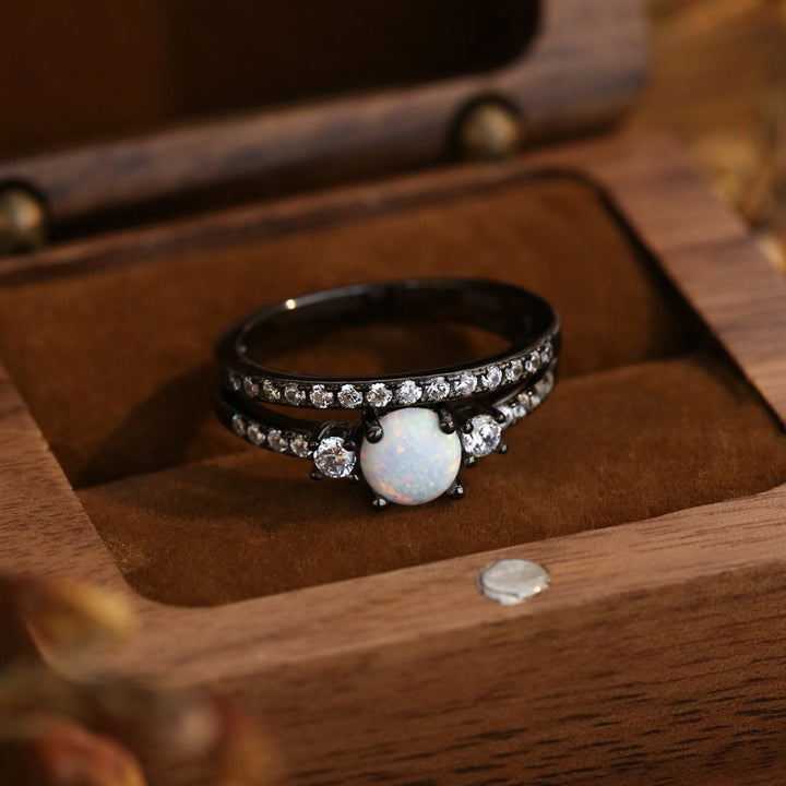 Anillo de oro negro de doble capa con circonitas y ópalo de Olivenorma S925 