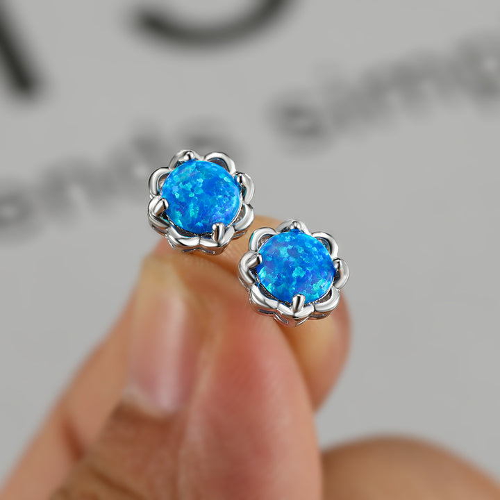 Pendientes de lujo de cuatro garras de ópalo en plata 925 de Olivenorma