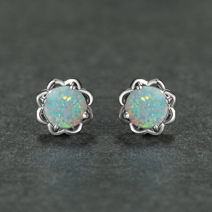 Pendientes de lujo de cuatro garras de ópalo en plata 925 de Olivenorma