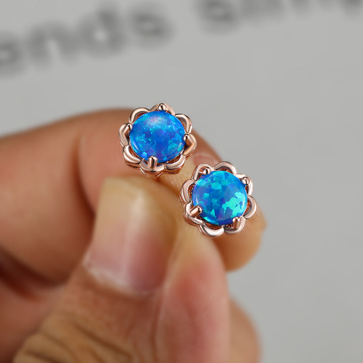 Pendientes de lujo de cuatro garras de ópalo en plata 925 de Olivenorma