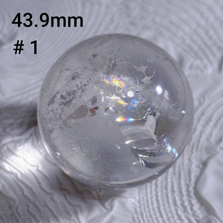 Bola de cristal pulida transparente de alta frecuencia natural de Olivenorma 