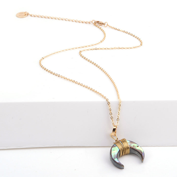 Collar de luna creciente con piedras preciosas de Olivenorma