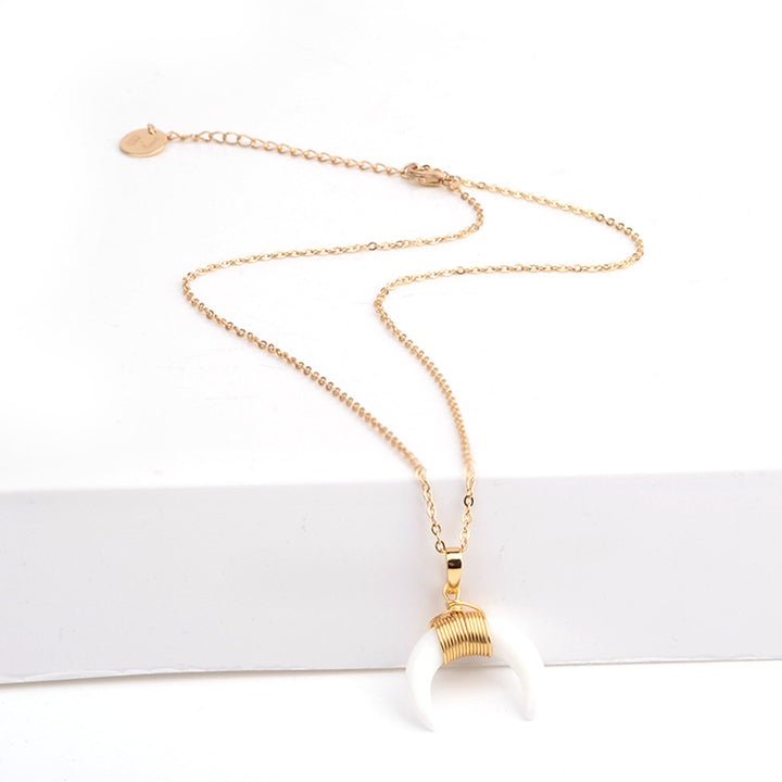 Collar de luna creciente con piedras preciosas de Olivenorma